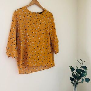 Fun Yellow Floral Print Top with Tie Sleeves